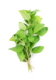 Photo of Fresh green lemon balm leaves isolated on white, top view