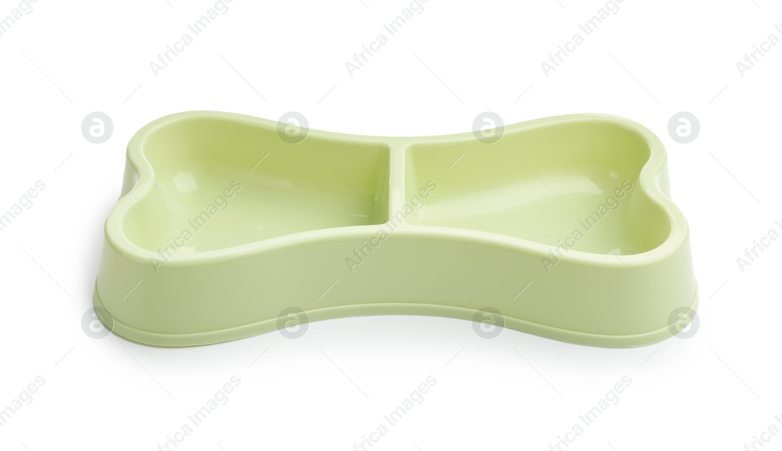 Empty feeding bowl for pet food isolated on white Photo of Empty feeding bowl for pet food isolated on white