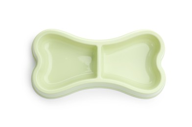 Photo of Empty feeding bowl for pet food isolated on white, top view