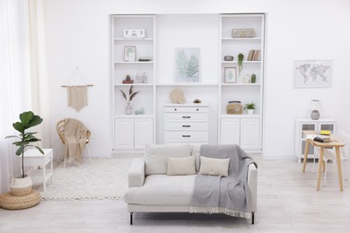 Photo of Stylish living room with beautiful furniture and houseplant
