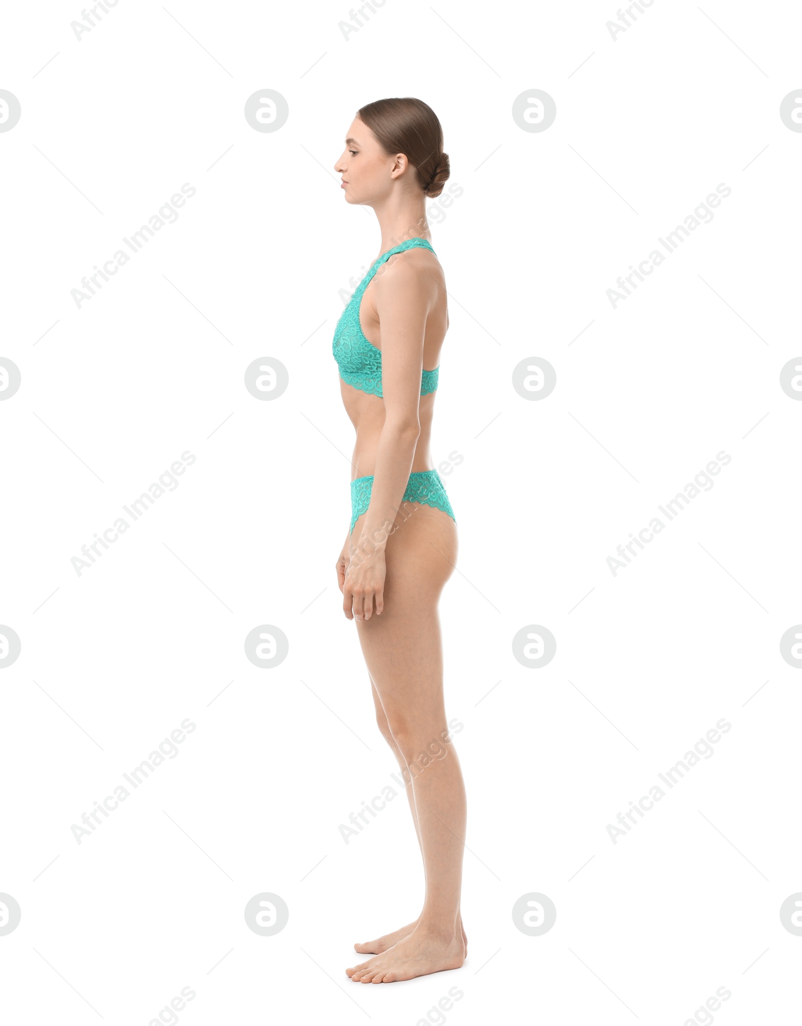 Woman wearing beautiful underwear on white background Photo of Woman wearing beautiful underwear on white background