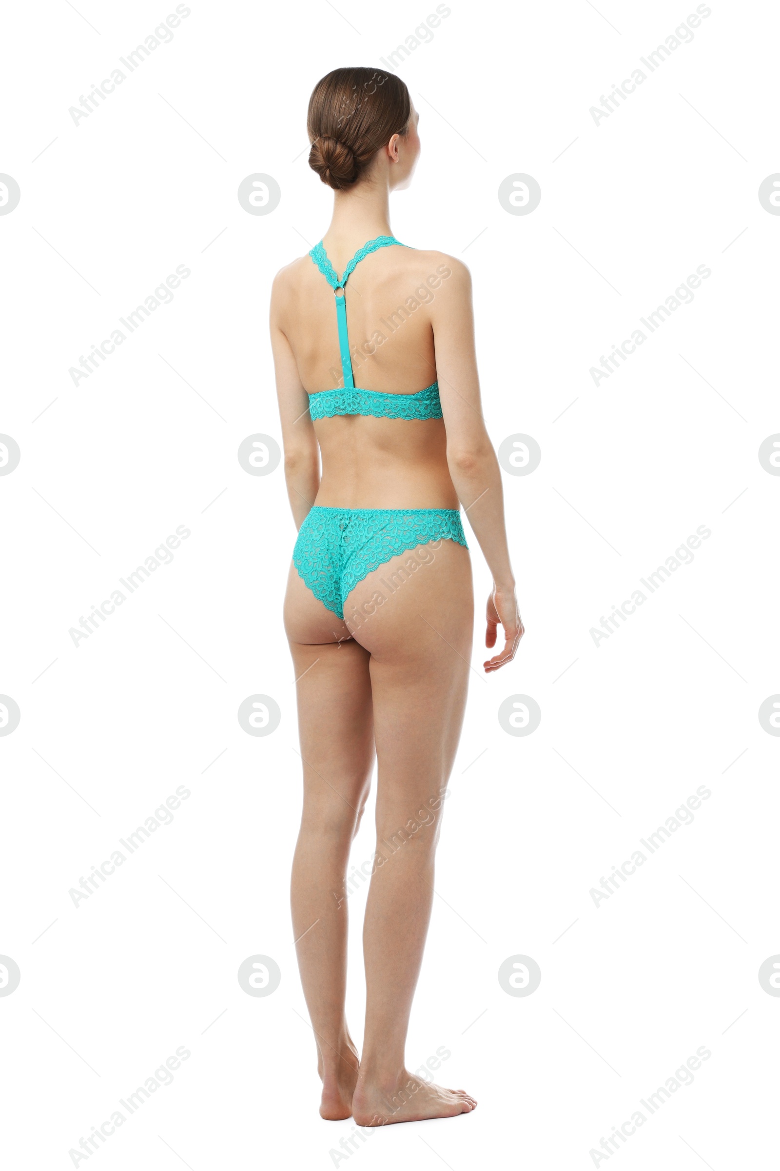 Woman wearing beautiful underwear on white background Photo of Woman wearing beautiful underwear on white background