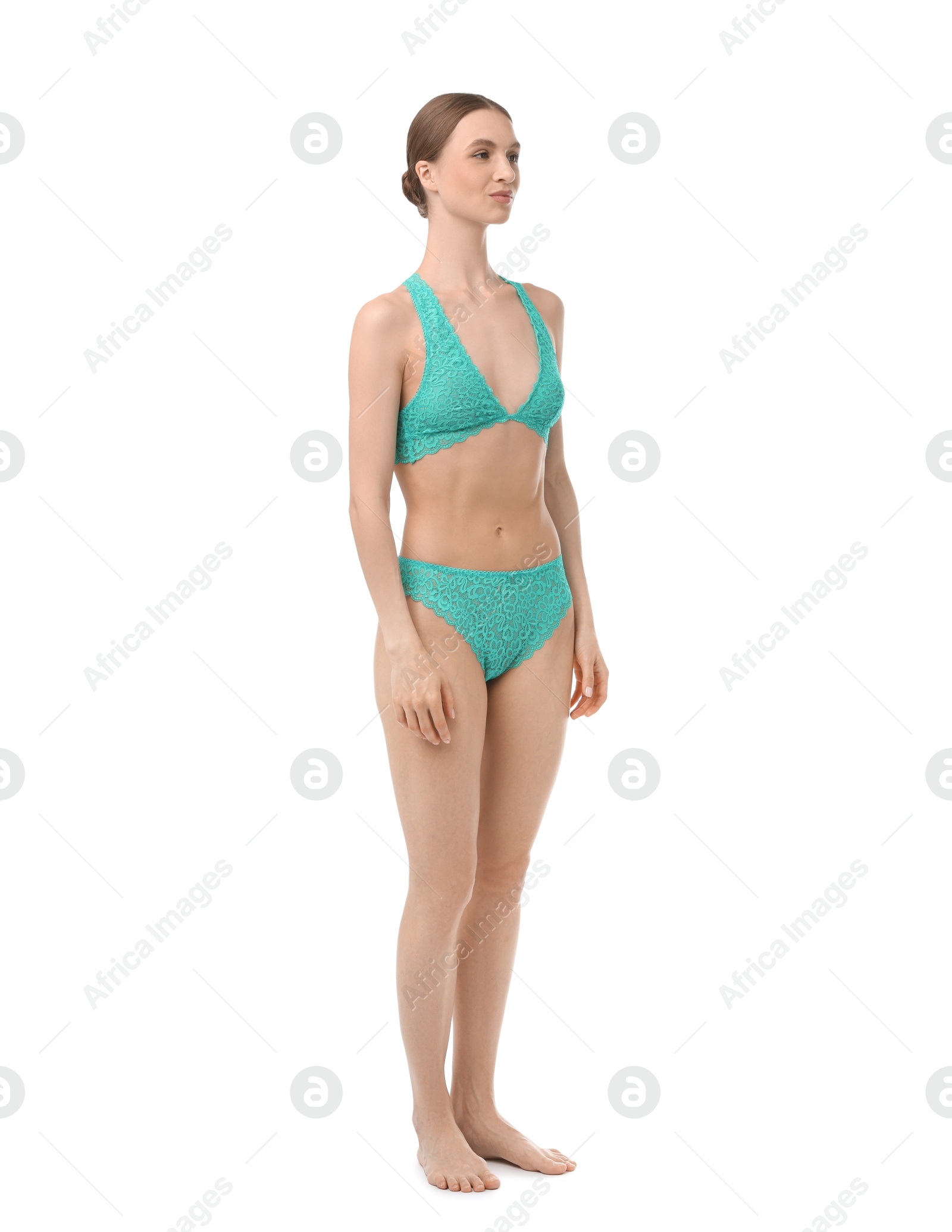 Woman wearing beautiful underwear on white background Photo of Woman wearing beautiful underwear on white background