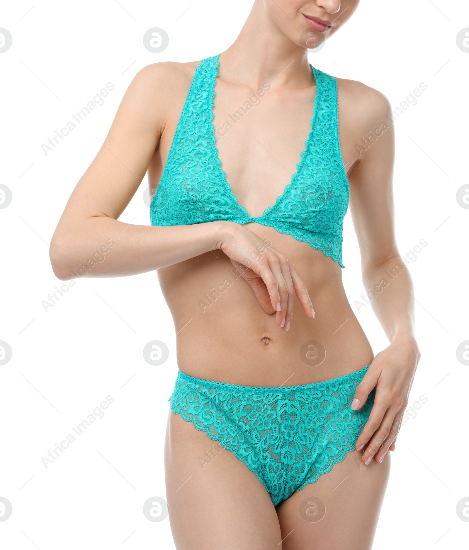 Woman wearing beautiful underwear on white background, closeup Photo of Woman wearing beautiful underwear on white background, closeup