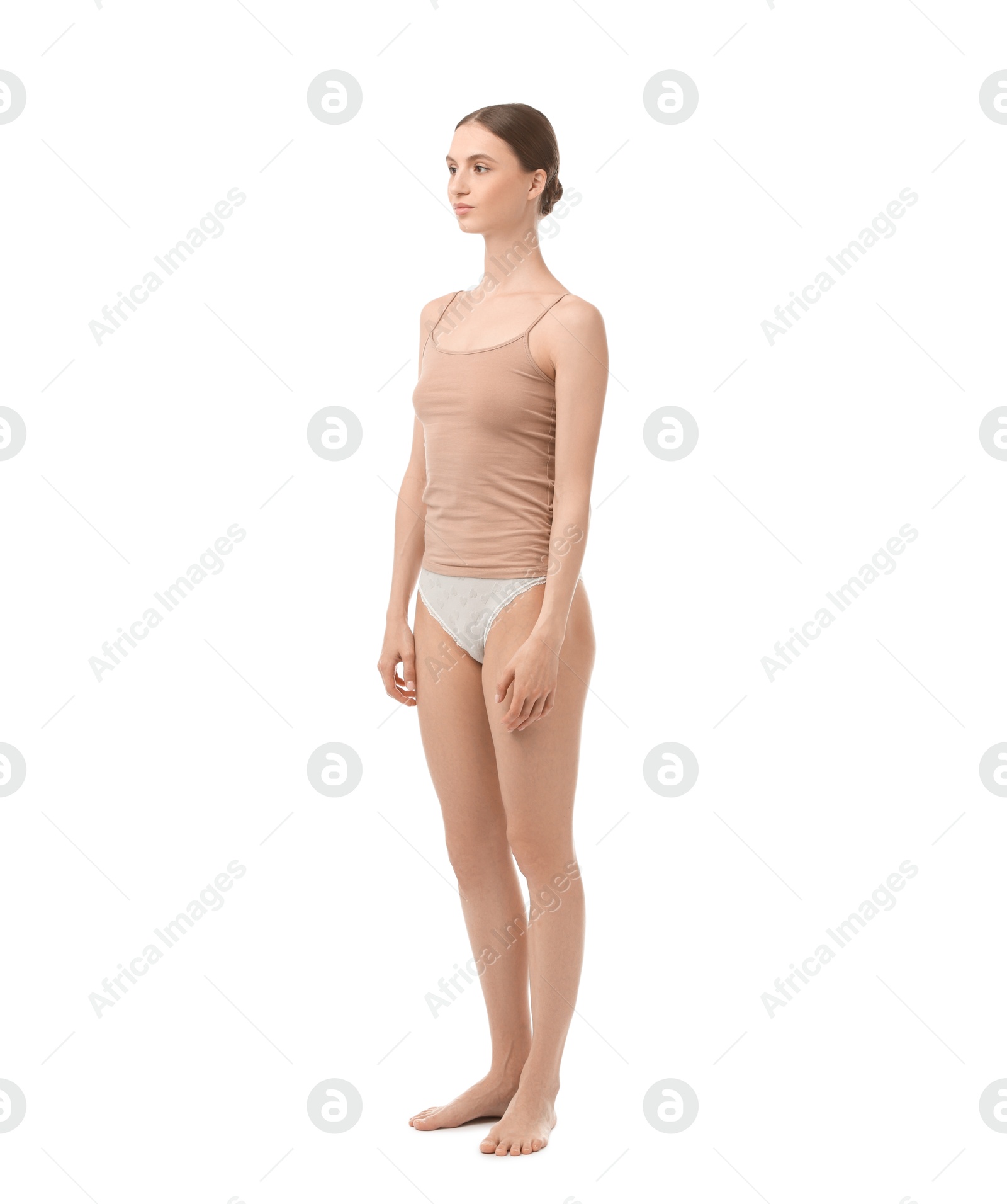 Woman wearing beautiful underwear on white background Photo of Woman wearing beautiful underwear on white background