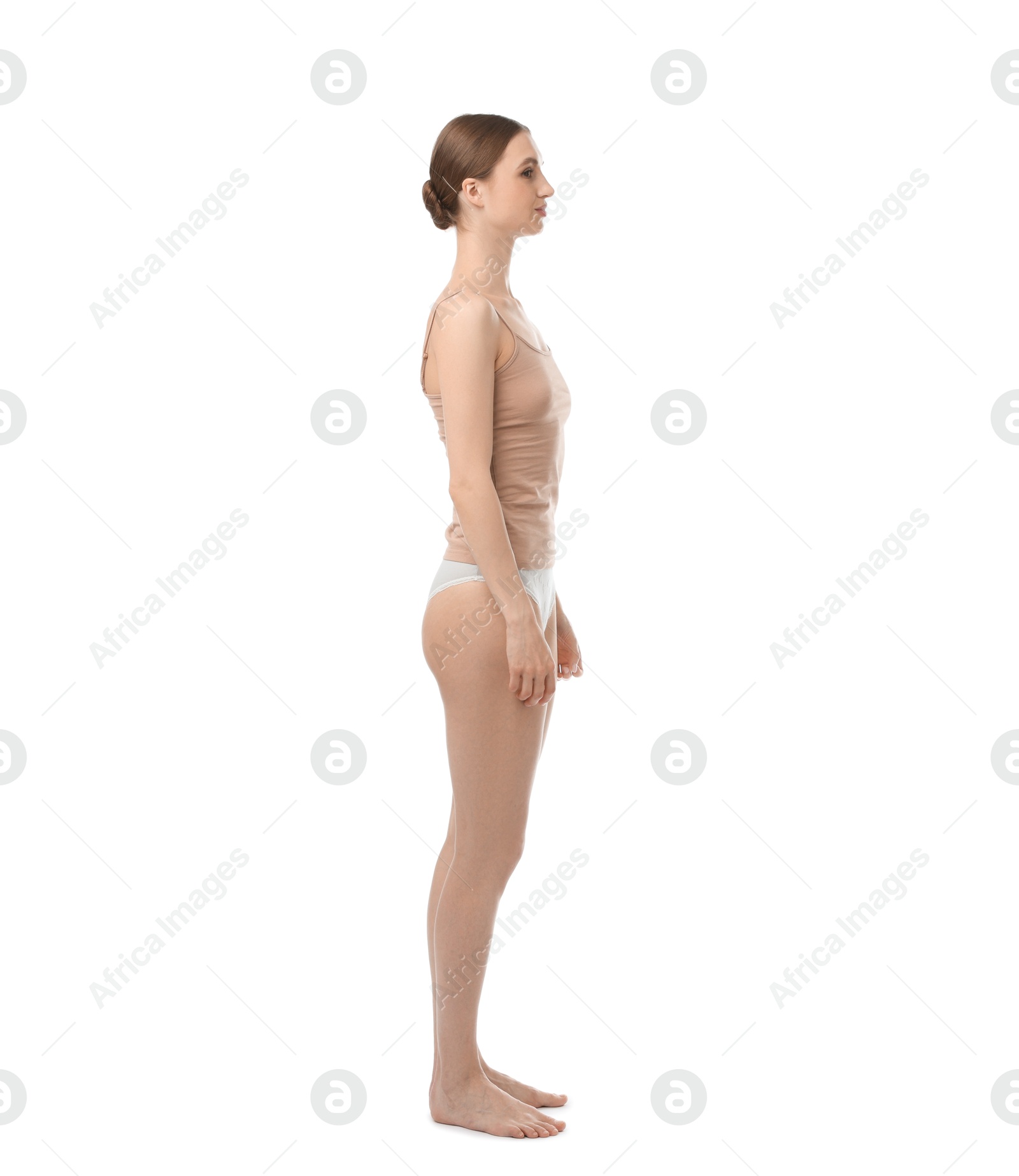 Woman wearing beautiful underwear on white background Photo of Woman wearing beautiful underwear on white background