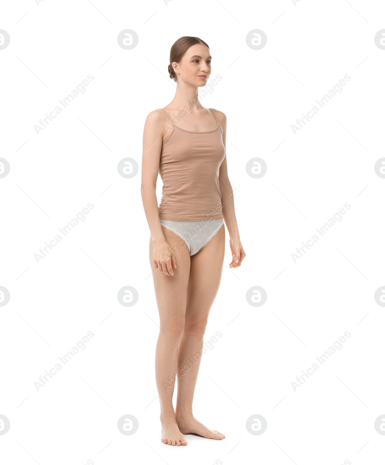 Woman wearing beautiful underwear on white background Photo of Woman wearing beautiful underwear on white background