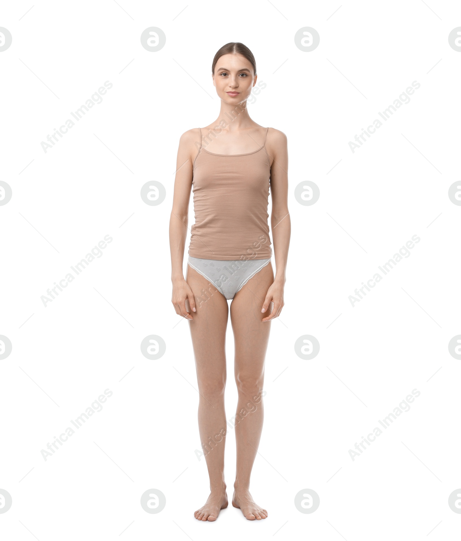 Woman wearing beautiful underwear on white background Photo of Woman wearing beautiful underwear on white background