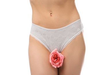 Photo of Woman with flower wearing beautiful underwear on white background, closeup