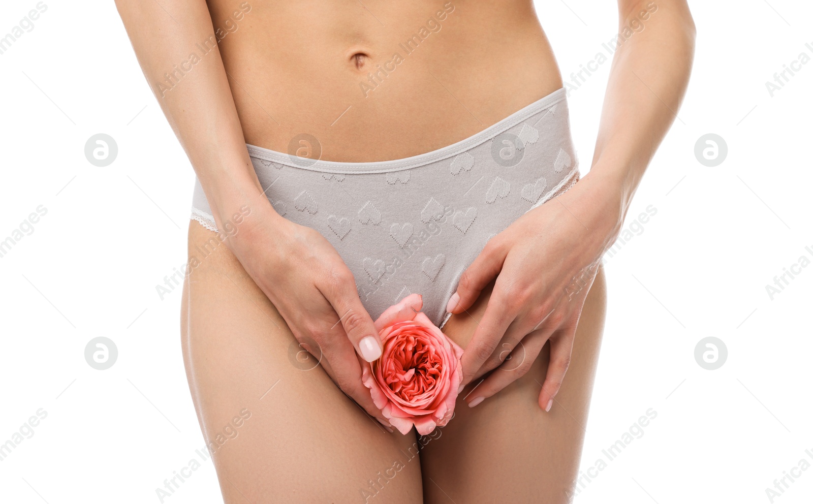Woman with flower wearing beautiful underwear on white background, closeup Photo of Woman with flower wearing beautiful underwear on white background, closeup