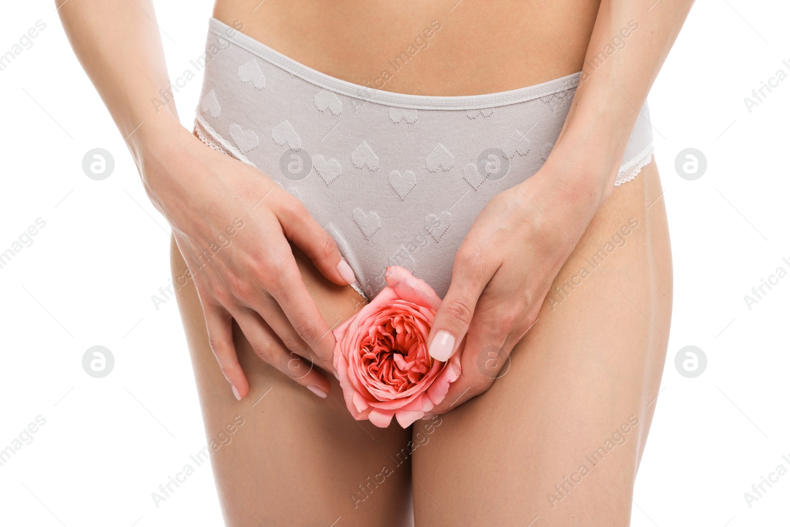 Woman with flower wearing beautiful underwear on white background, closeup Photo of Woman with flower wearing beautiful underwear on white background, closeup