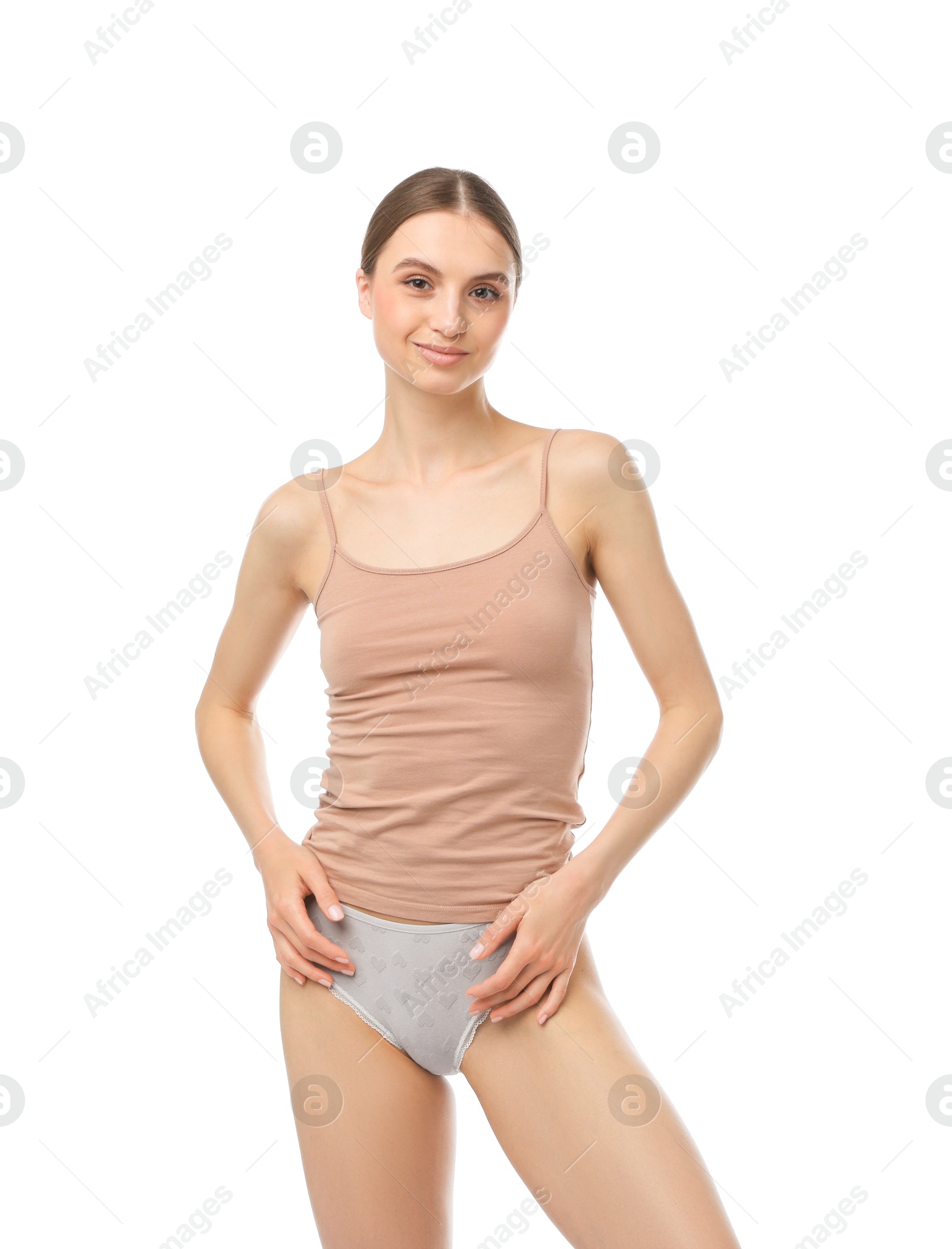Woman wearing beautiful underwear on white background Photo of Woman wearing beautiful underwear on white background