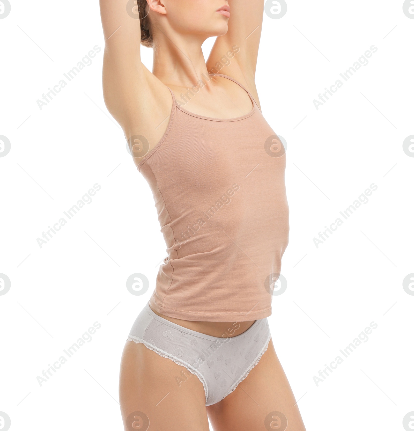 Woman wearing beautiful underwear on white background, closeup Photo of Woman wearing beautiful underwear on white background, closeup