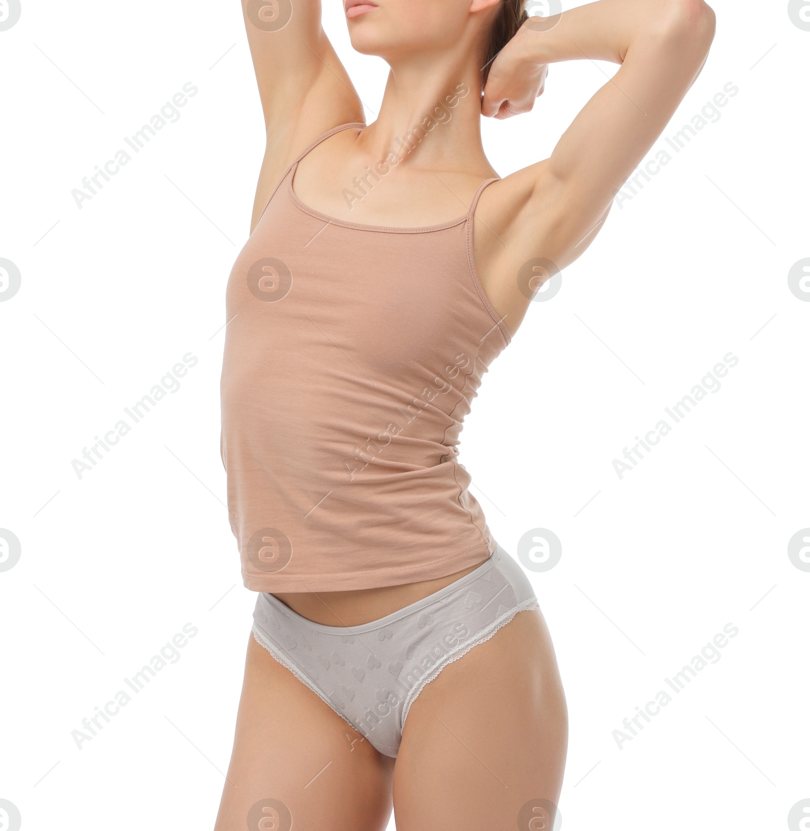 Woman wearing beautiful underwear on white background, closeup Photo of Woman wearing beautiful underwear on white background, closeup
