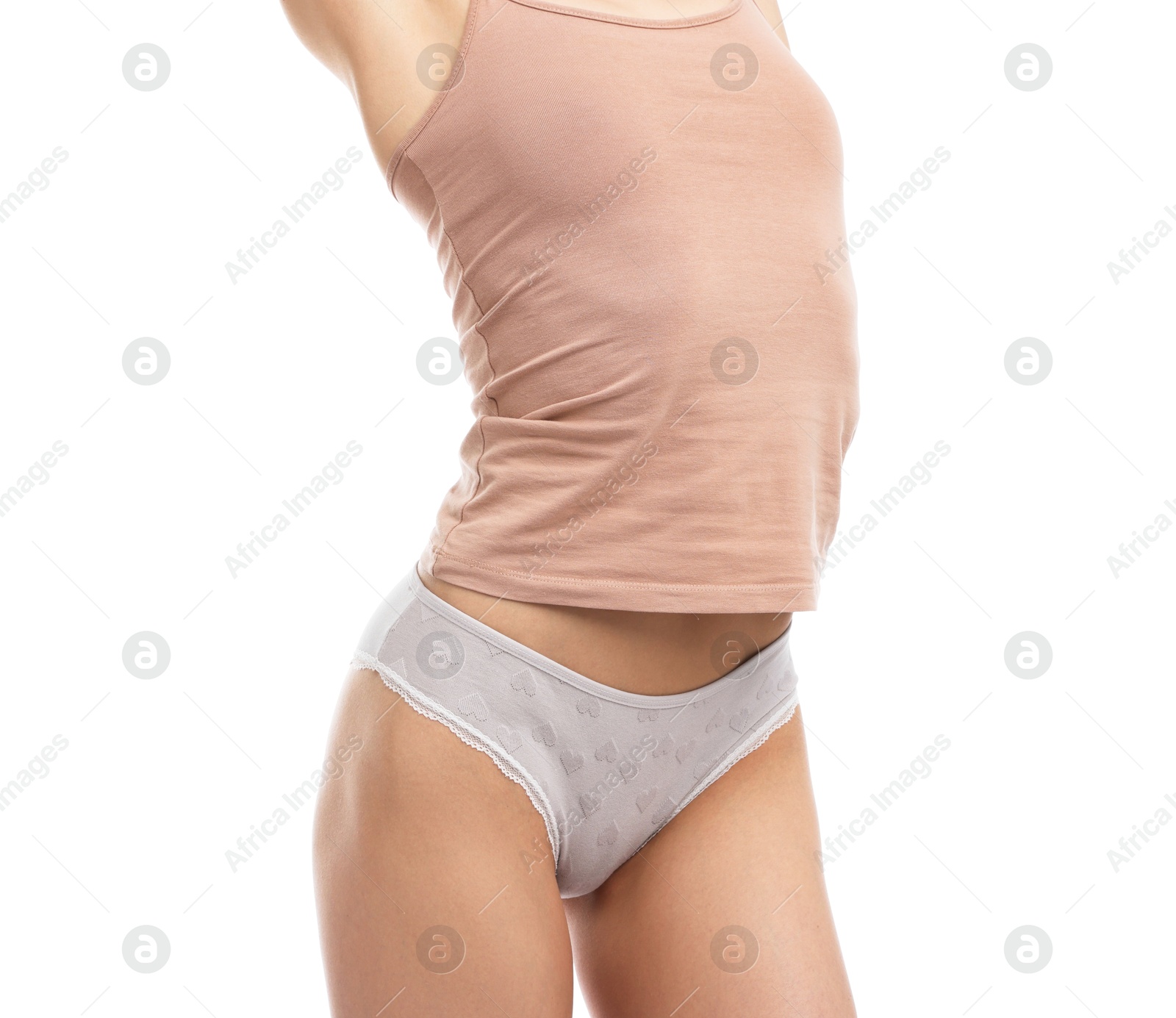 Woman wearing beautiful underwear on white background, closeup Photo of Woman wearing beautiful underwear on white background, closeup