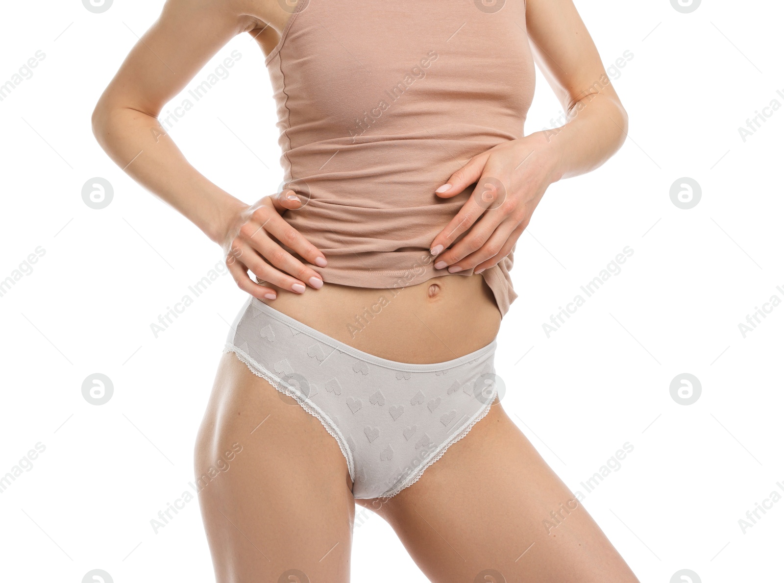 Woman wearing beautiful underwear on white background, closeup Photo of Woman wearing beautiful underwear on white background, closeup