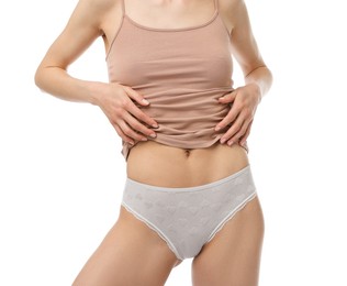 Photo of Woman wearing beautiful underwear on white background, closeup
