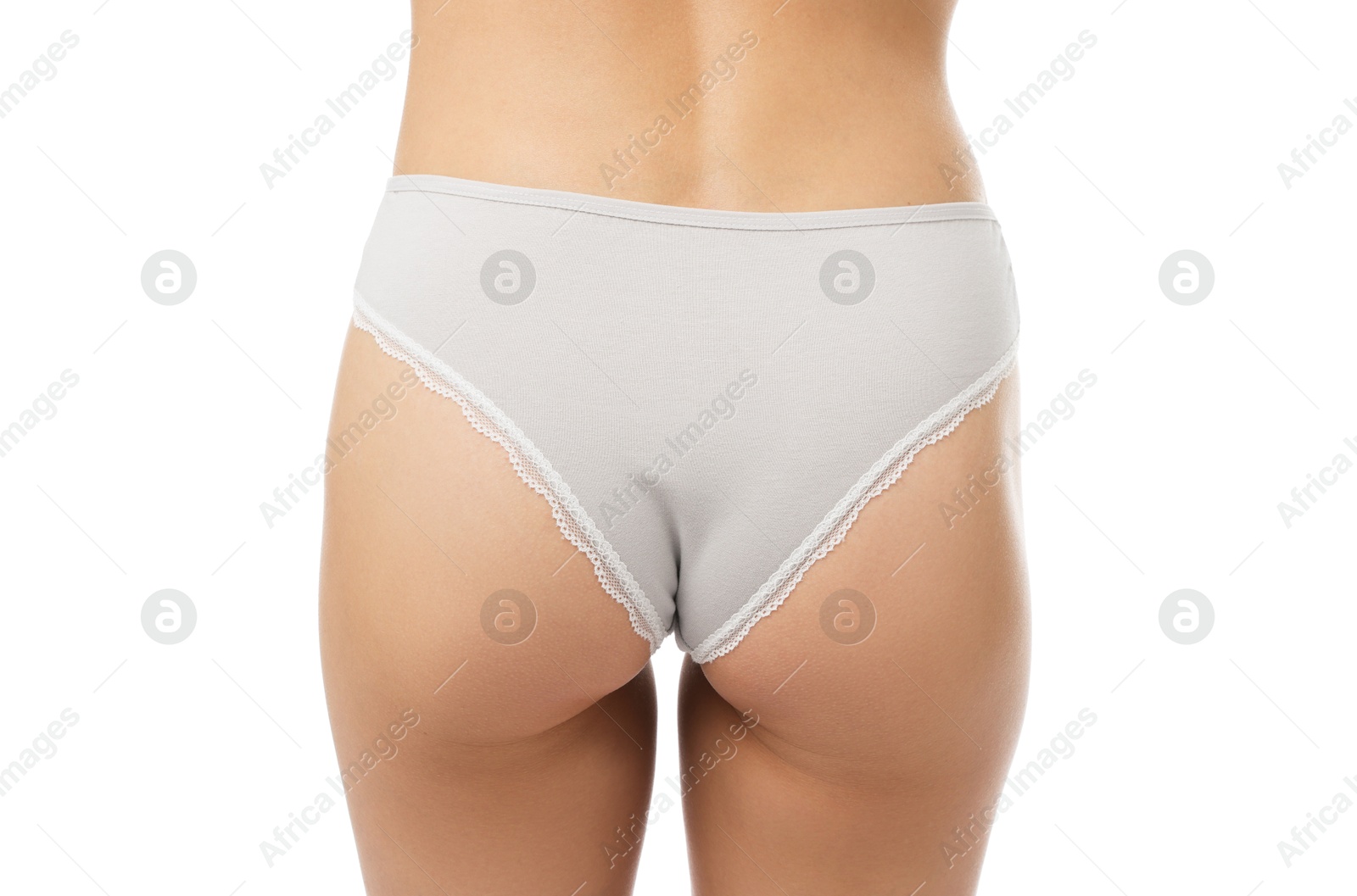 Woman wearing beautiful underwear on white background, closeup Photo of Woman wearing beautiful underwear on white background, closeup