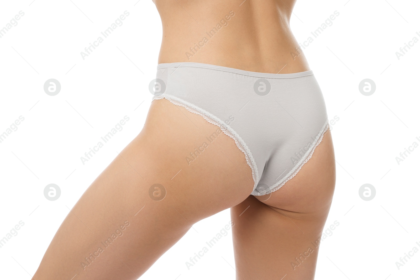 Woman wearing beautiful underwear on white background, closeup Photo of Woman wearing beautiful underwear on white background, closeup