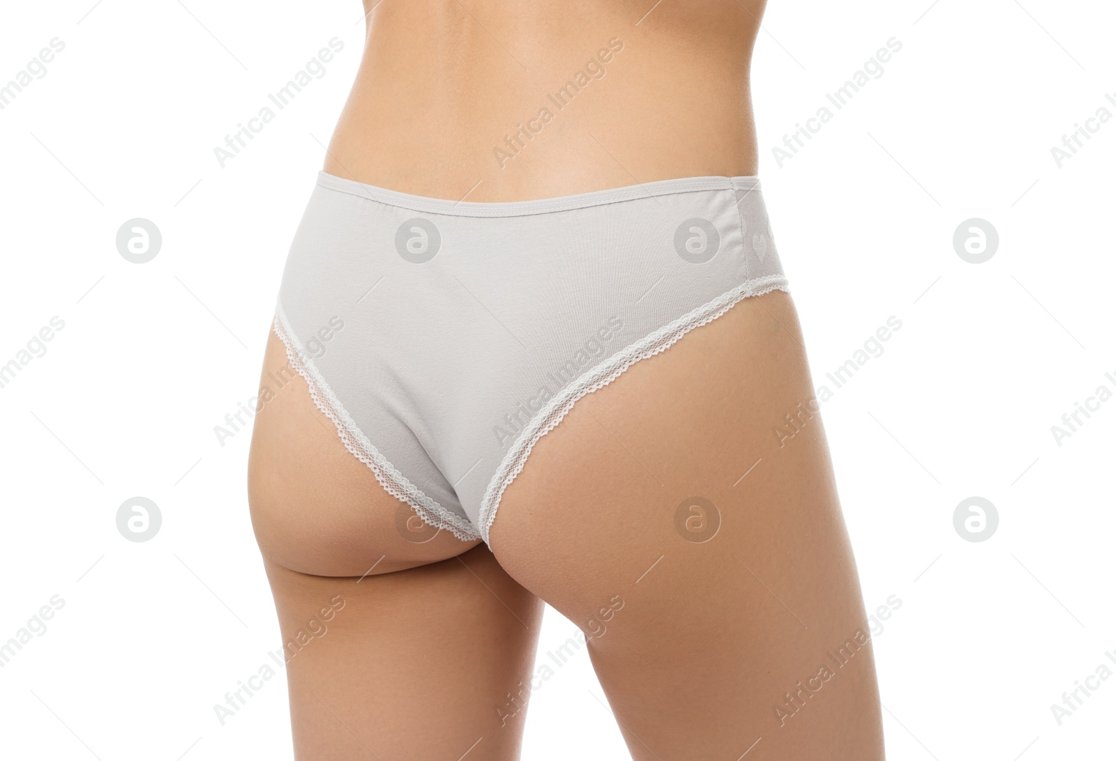 Woman wearing beautiful underwear on white background, closeup Photo of Woman wearing beautiful underwear on white background, closeup