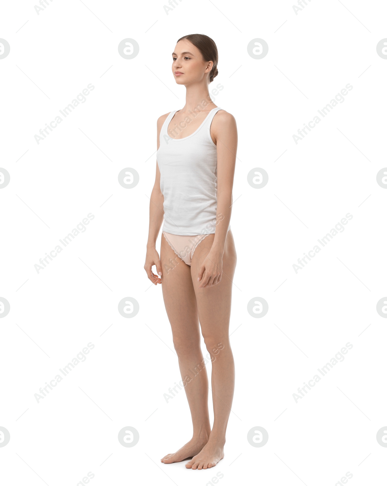 Woman wearing beautiful underwear on white background Photo of Woman wearing beautiful underwear on white background