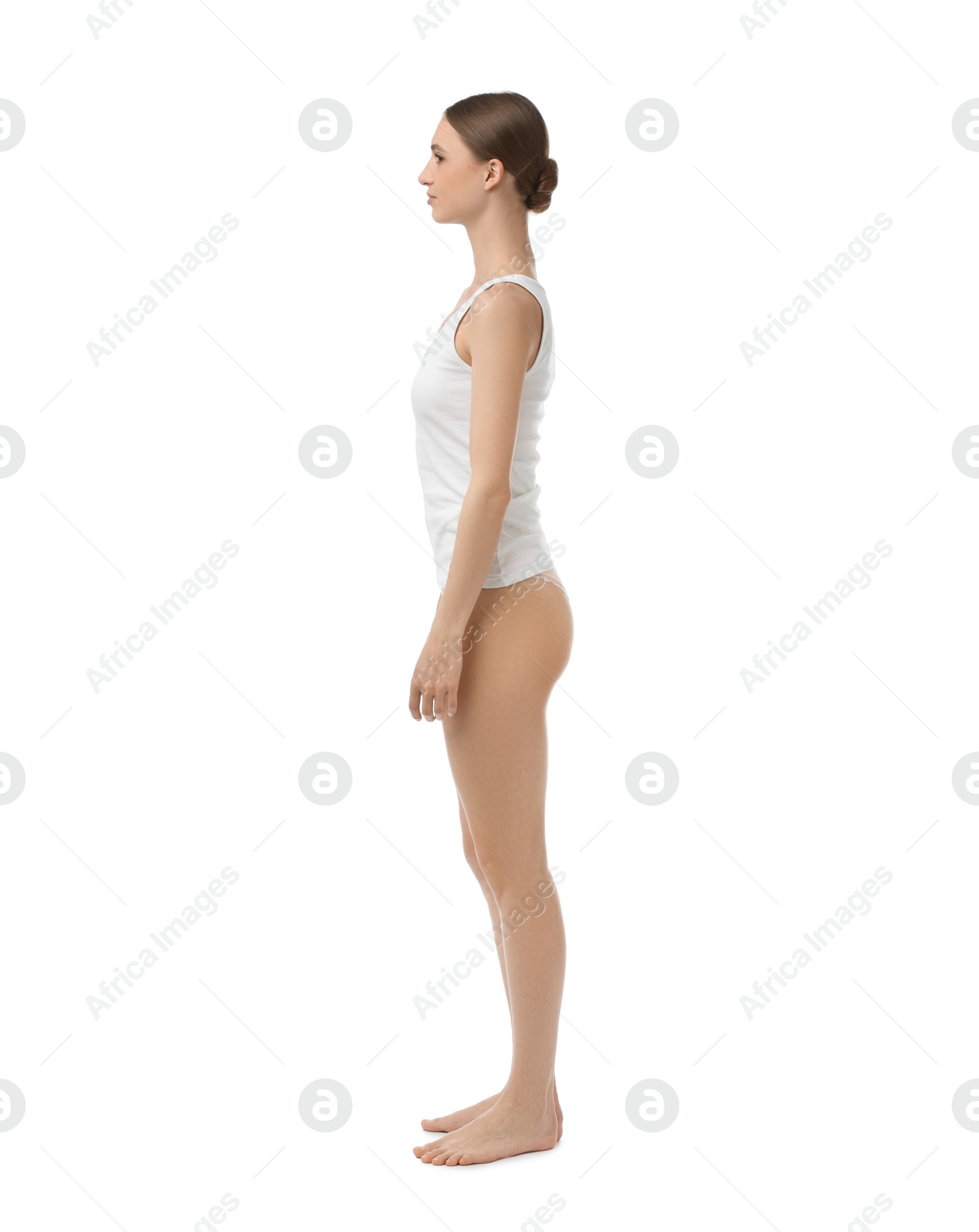 Woman wearing beautiful underwear on white background Photo of Woman wearing beautiful underwear on white background