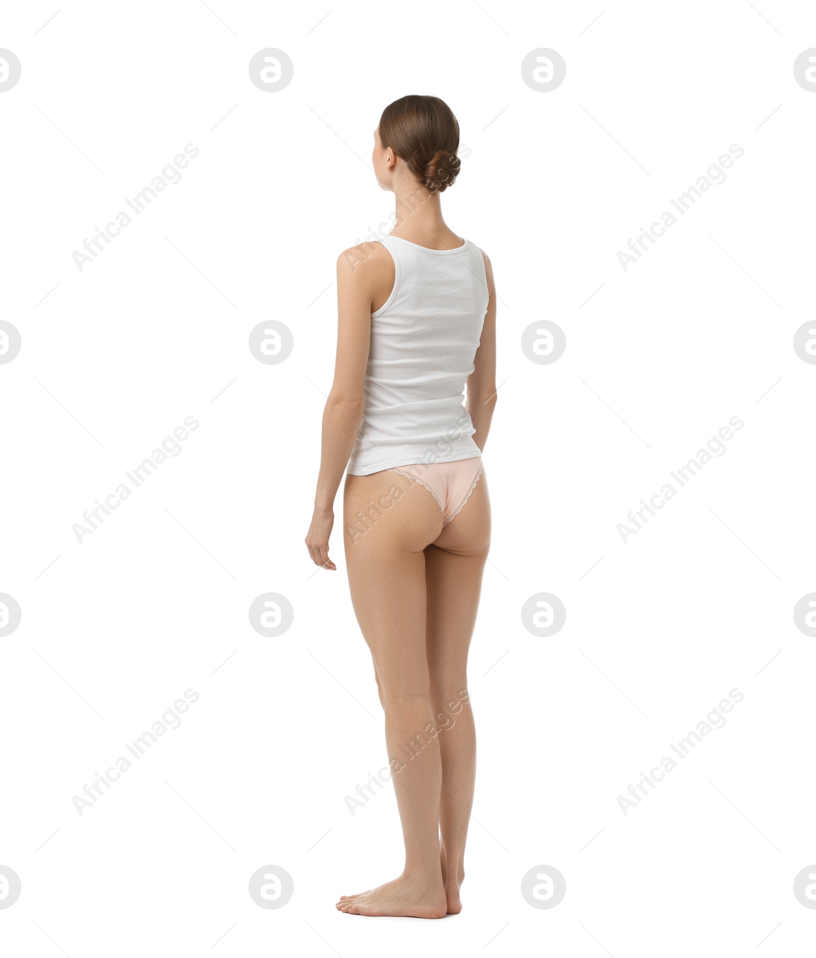 Woman wearing beautiful underwear on white background Photo of Woman wearing beautiful underwear on white background