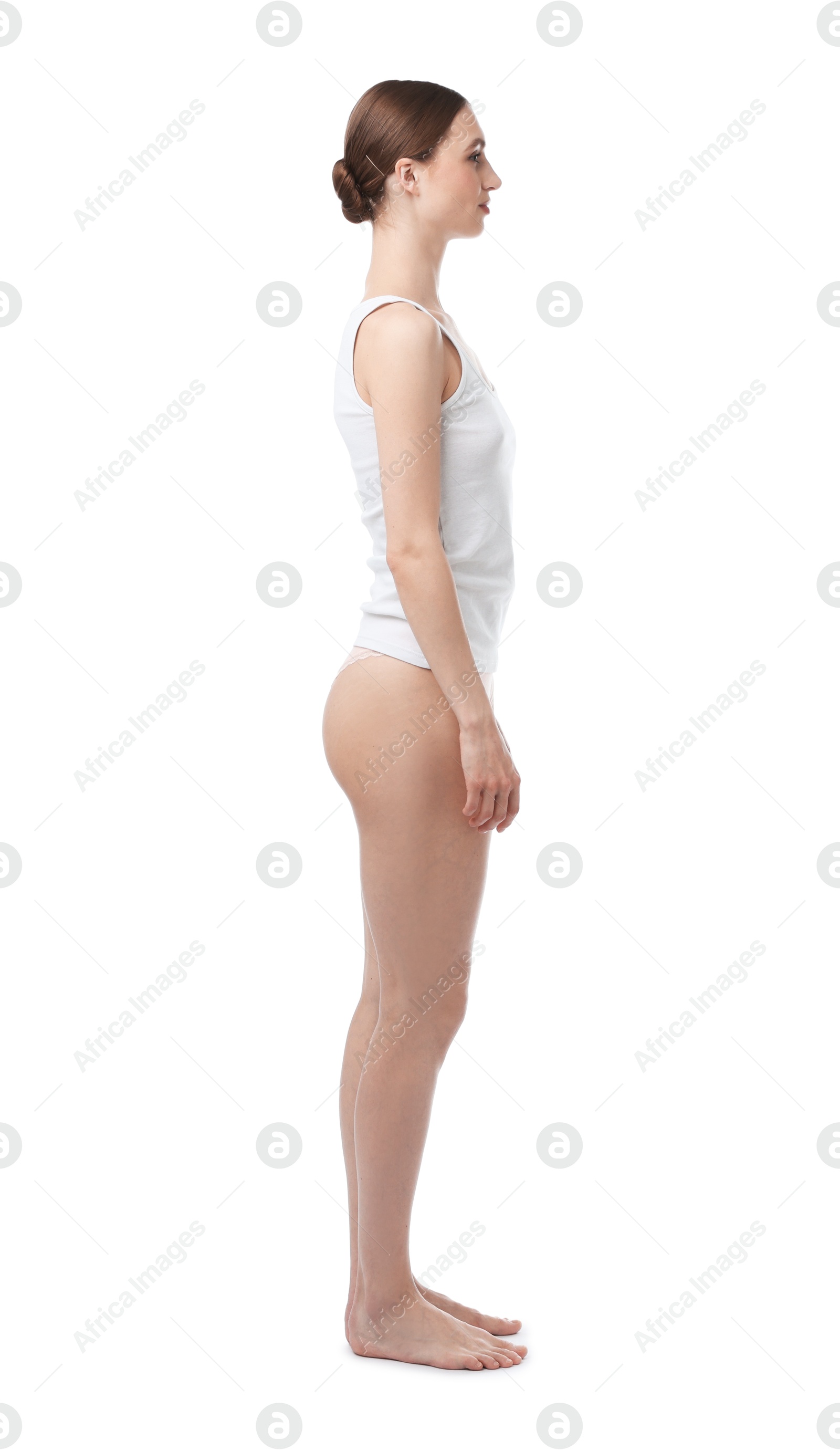 Woman wearing beautiful underwear on white background Photo of Woman wearing beautiful underwear on white background