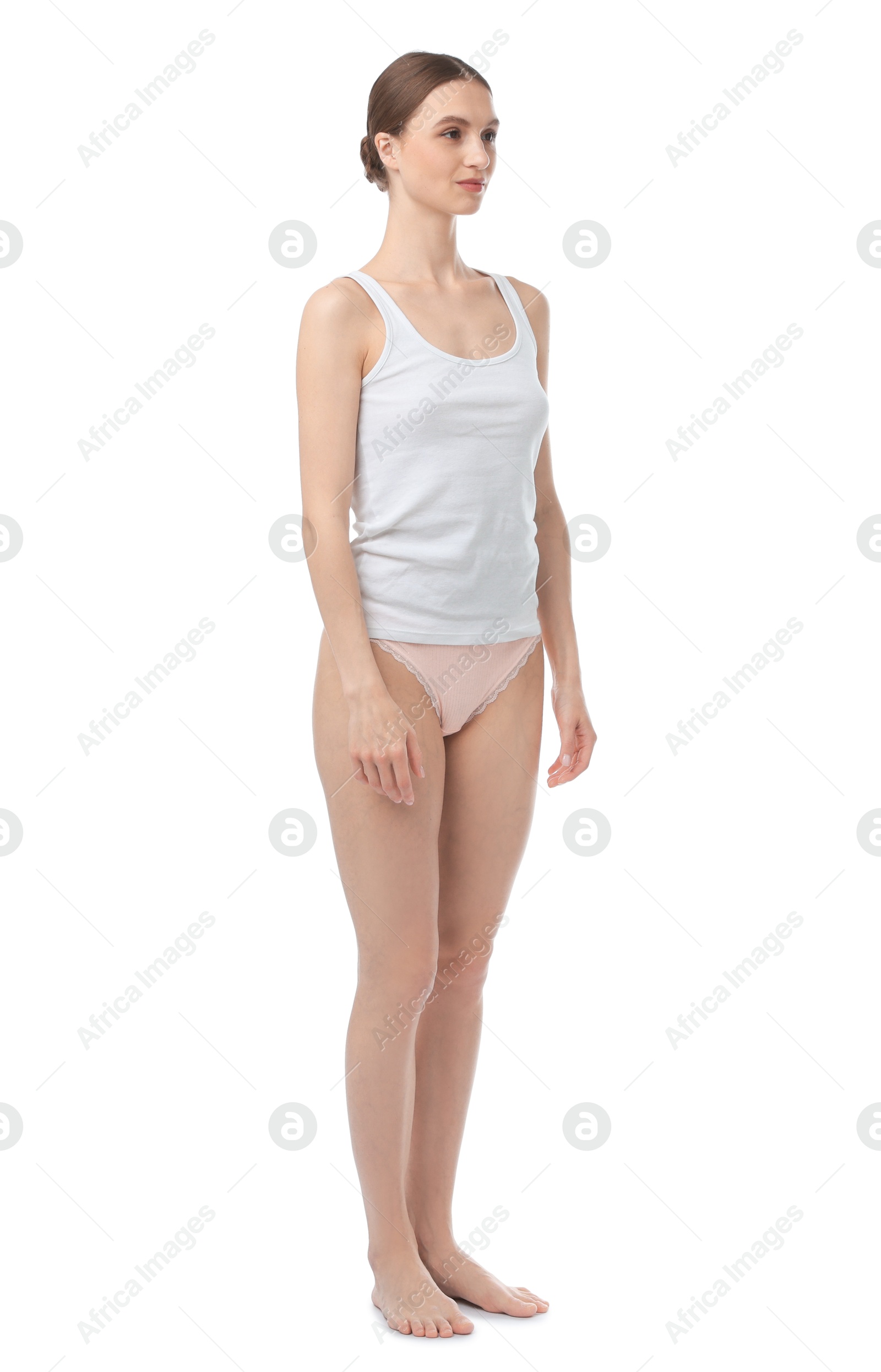 Woman wearing beautiful underwear on white background Photo of Woman wearing beautiful underwear on white background