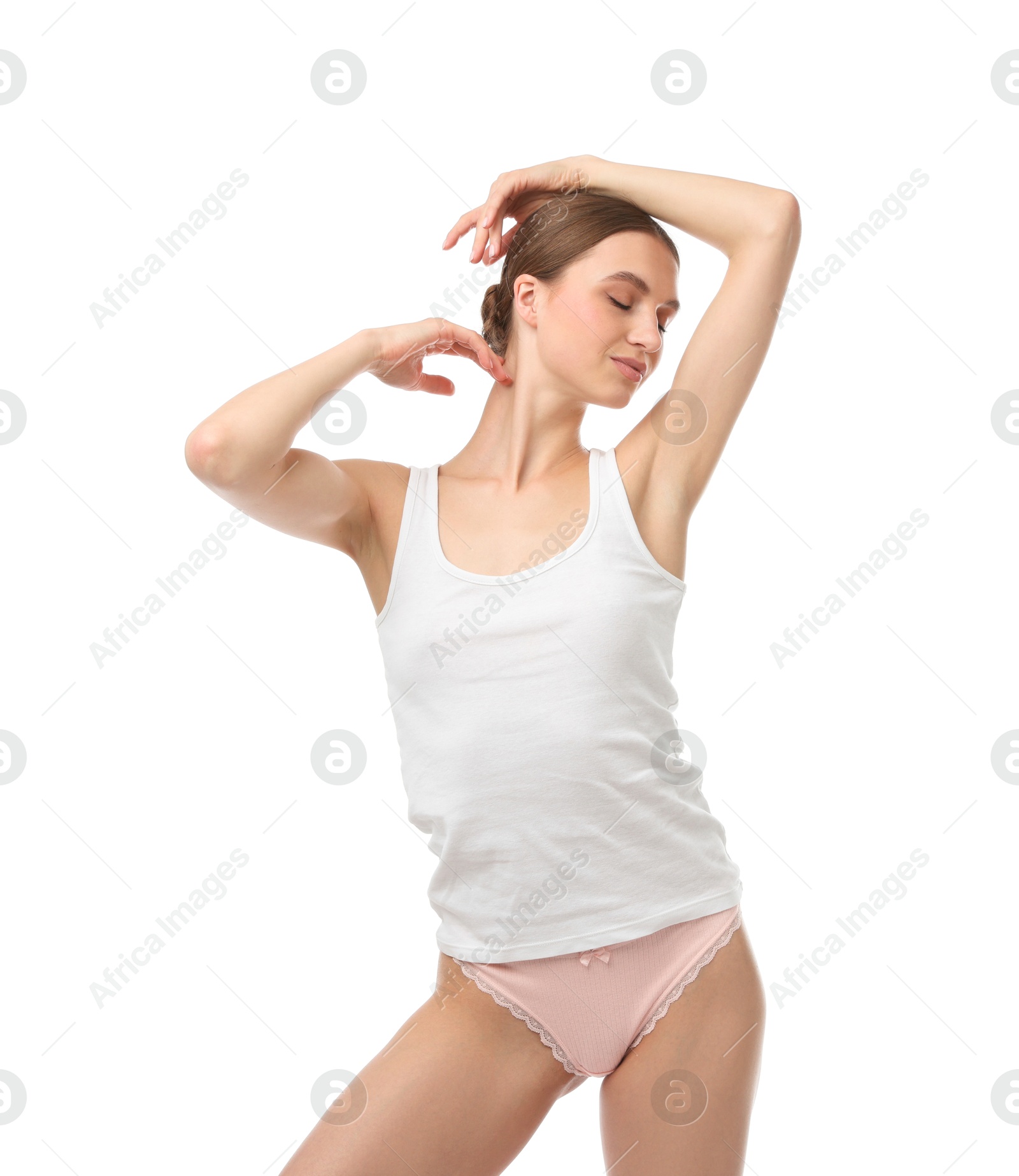 Woman wearing beautiful underwear on white background Photo of Woman wearing beautiful underwear on white background