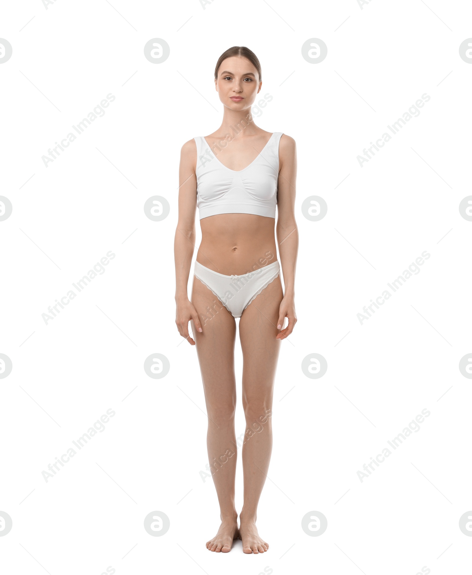 Woman wearing beautiful underwear on white background Photo of Woman wearing beautiful underwear on white background