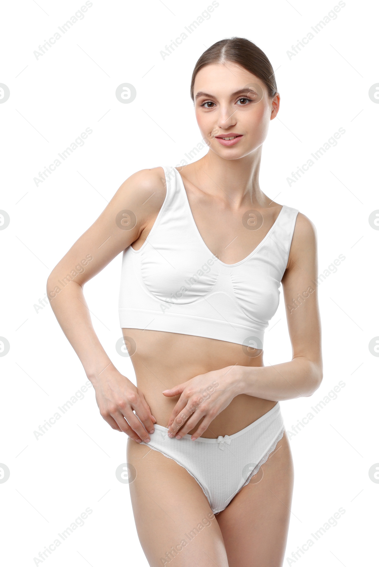 Woman wearing beautiful underwear on white background Photo of Woman wearing beautiful underwear on white background