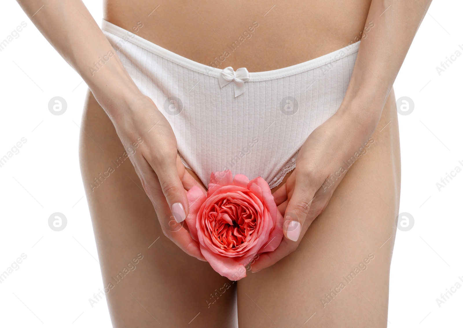 Woman with flower wearing beautiful underwear on white background, closeup Photo of Woman with flower wearing beautiful underwear on white background, closeup