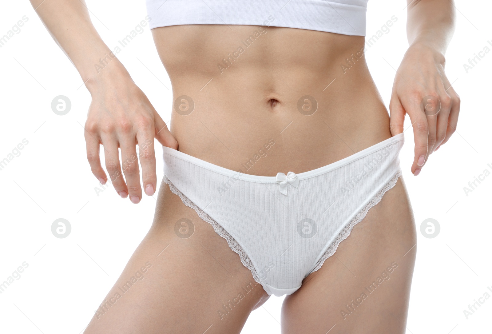 Woman wearing beautiful underwear on white background, closeup Photo of Woman wearing beautiful underwear on white background, closeup