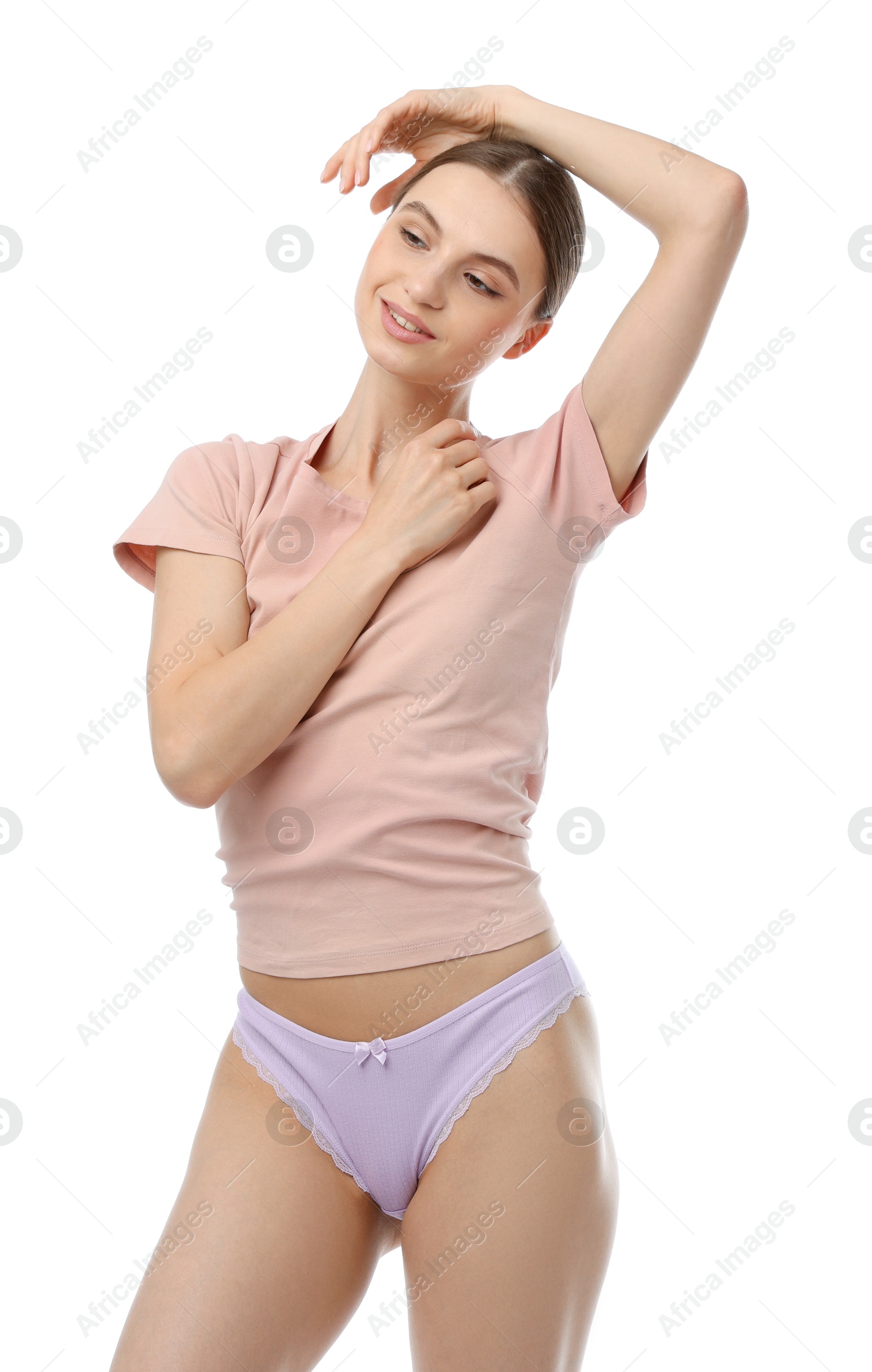 Woman wearing beautiful underwear on white background Photo of Woman wearing beautiful underwear on white background