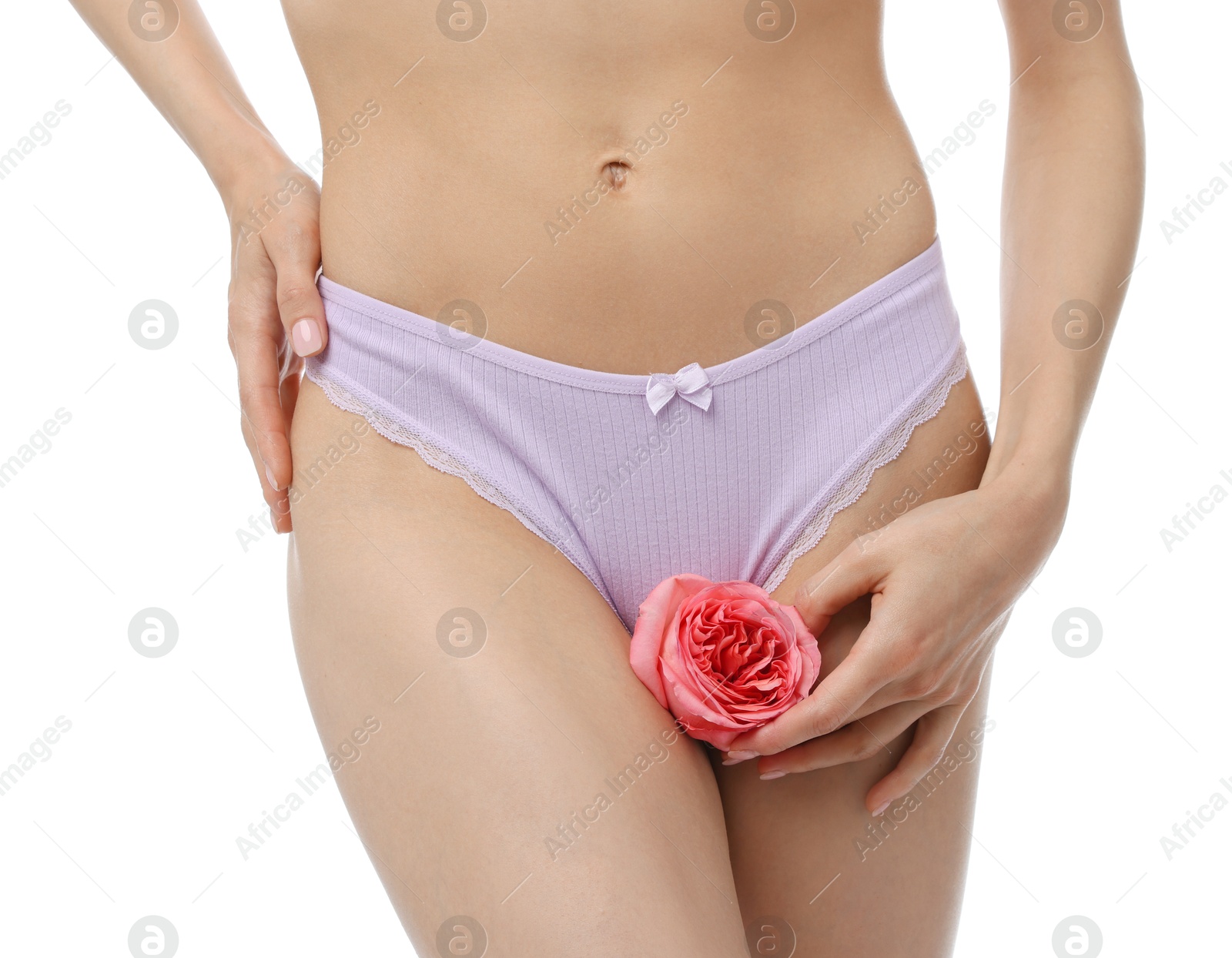 Woman with flower wearing beautiful underwear on white background, closeup Photo of Woman with flower wearing beautiful underwear on white background, closeup