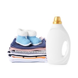 Photo of Bottle with fabric softener, shoes and baby clothes isolated on white