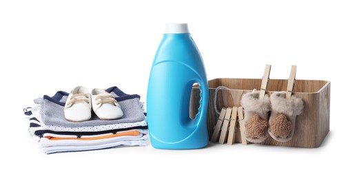 Photo of Bottle with fabric softener, shoes, basket, baby clothes and clothespins isolated on white