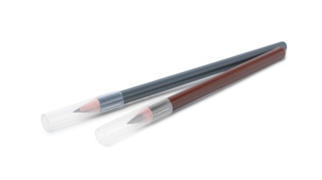 Photo of Two different eyebrow pencils isolated on white