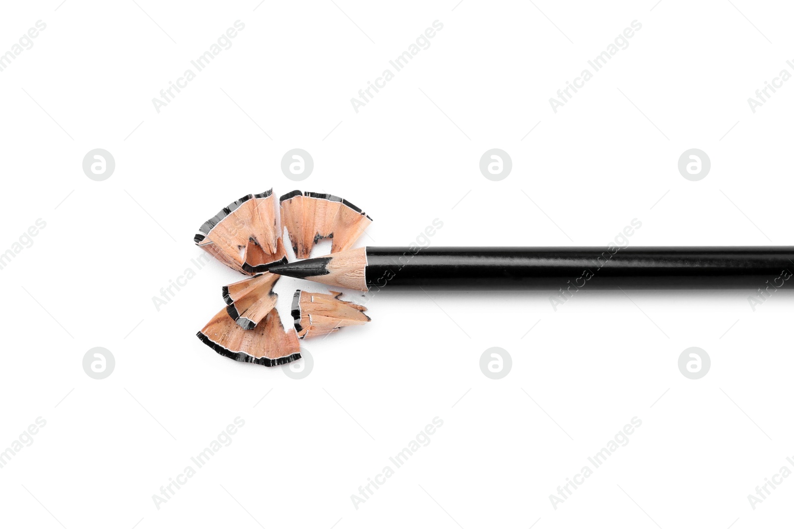 Beautiful eyebrow pencil and shavings isolated on white, top view Photo of Beautiful eyebrow pencil and shavings isolated on white, top view