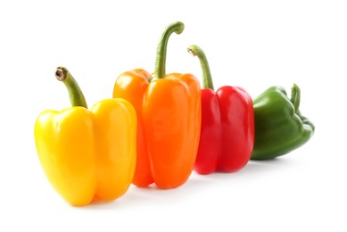Photo of Ripe colorful bell peppers isolated on white
