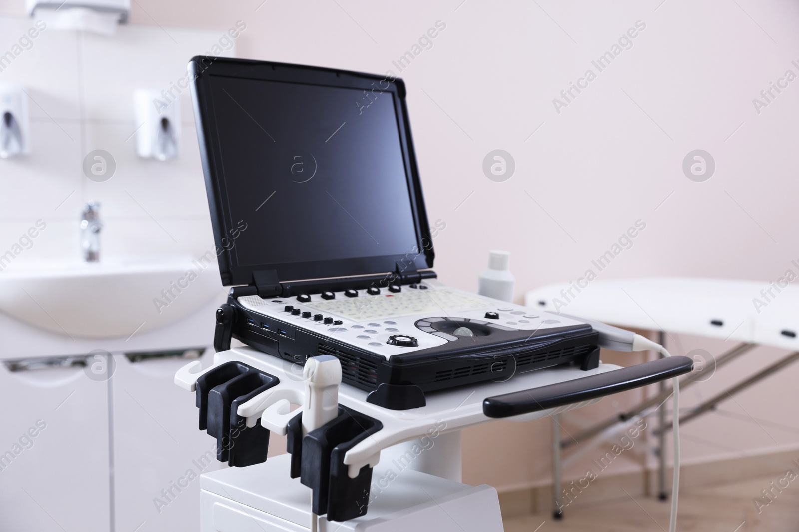 Modern ultrasound machine in clinic. Medical equipment Photo of Modern ultrasound machine in clinic. Medical equipment