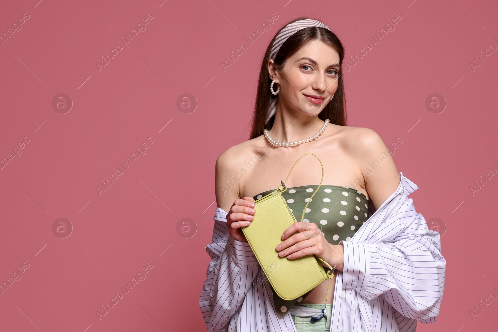 Fashionable portrait of beautiful woman in stylish outfit on pink background. Space for text Photo of Fashionable portrait of beautiful woman in stylish outfit on pink background. Space for text