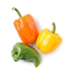 Photo of Ripe colorful bell peppers isolated on white, top view