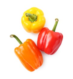Photo of Ripe colorful bell peppers isolated on white, top view