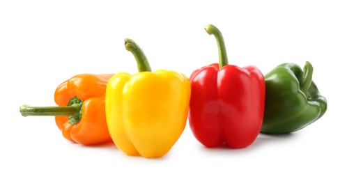 Photo of Ripe colorful bell peppers isolated on white