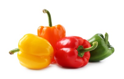 Photo of Ripe colorful bell peppers isolated on white