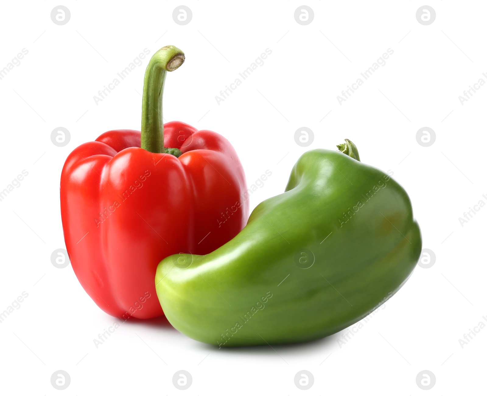 Ripe colorful bell peppers isolated on white Photo of Ripe colorful bell peppers isolated on white