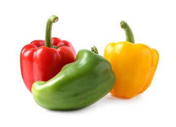 Photo of Ripe colorful bell peppers isolated on white