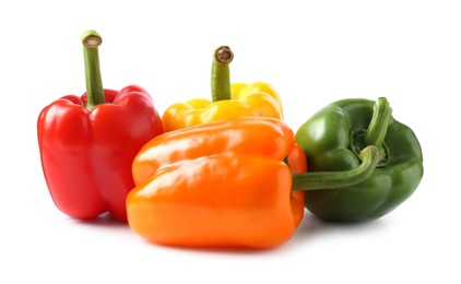 Photo of Ripe colorful bell peppers isolated on white